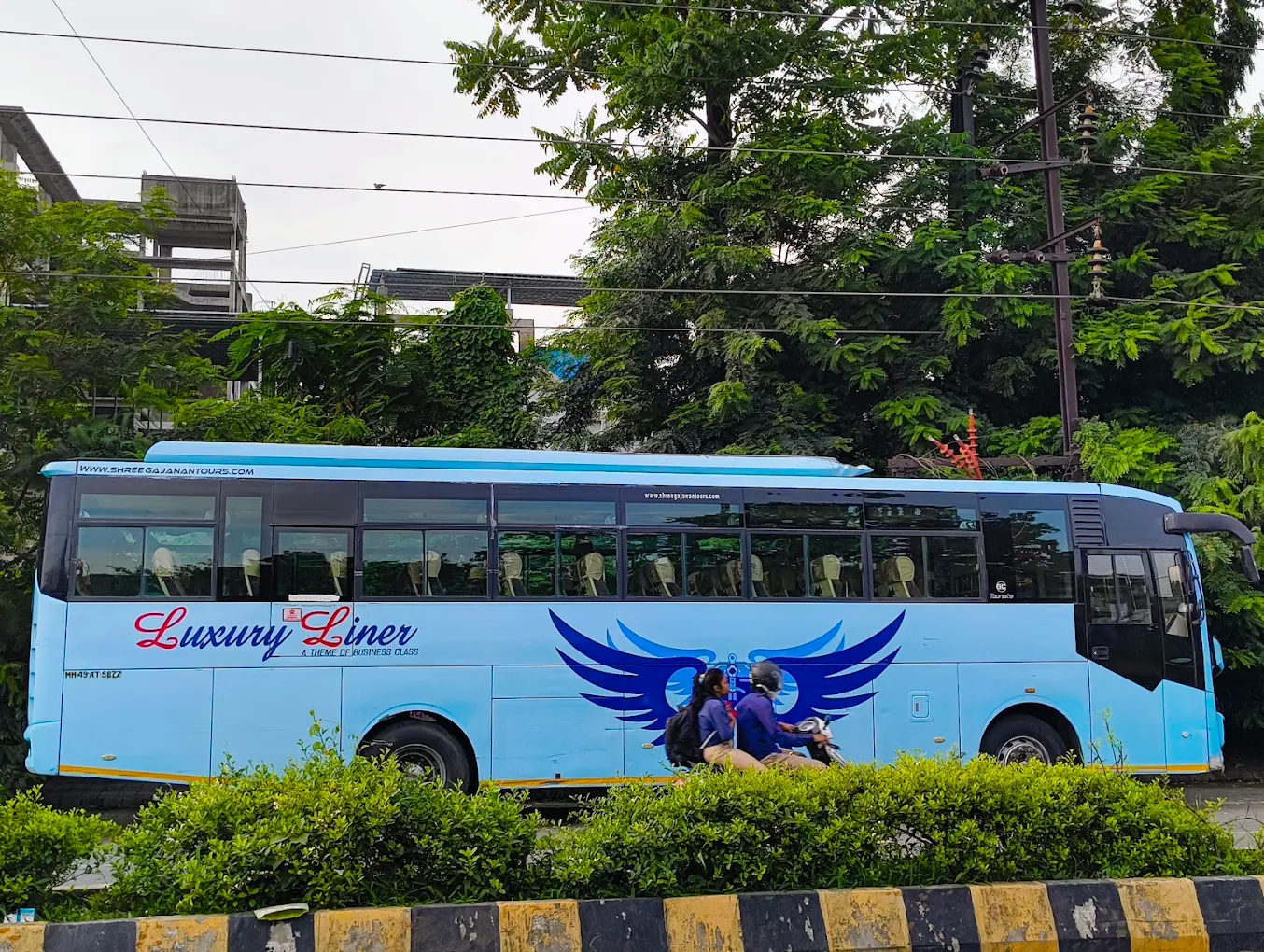 SGT Luxury Liner bus side view